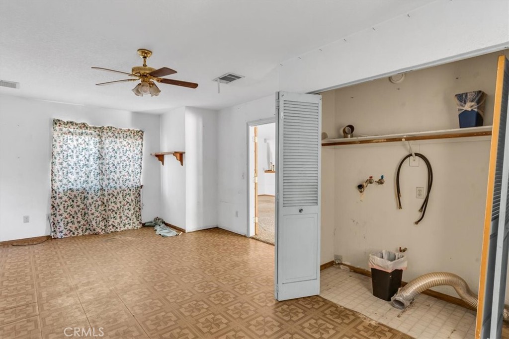 7633 I Avenue Hesperia, CA 92345 - Photo 18 of 22 a view of a livingroom with a staircase