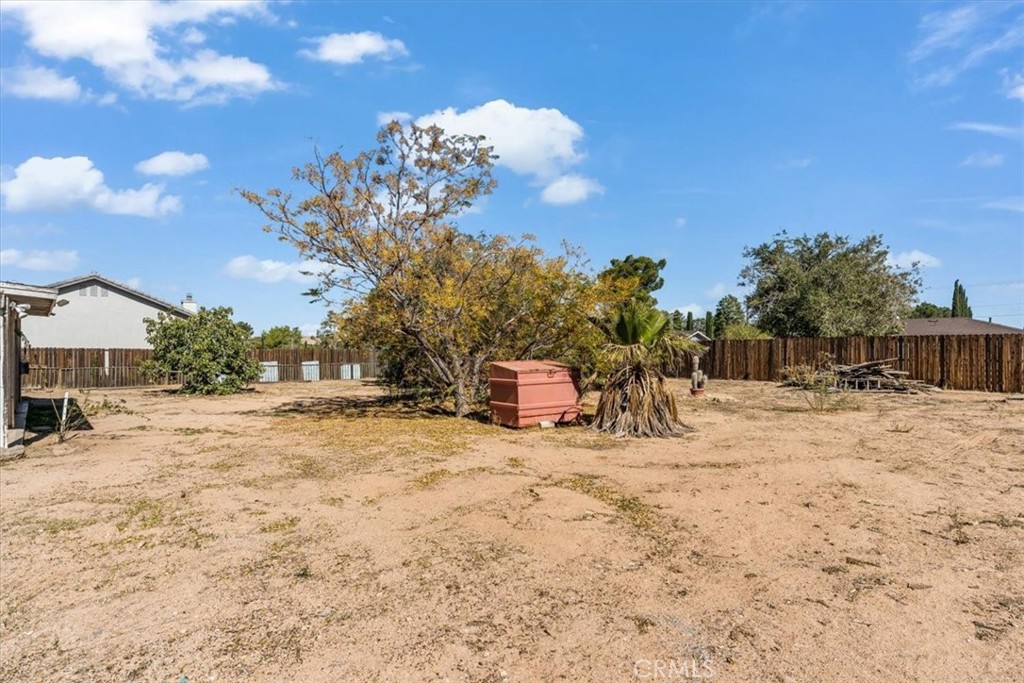 7633 I Avenue Hesperia, CA 92345 - Photo 22 of 22 a view of a house with a snow in the yard