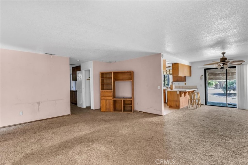 7633 I Avenue Hesperia, CA 92345 - Photo 5 of 22 an empty room with furniture and a window
