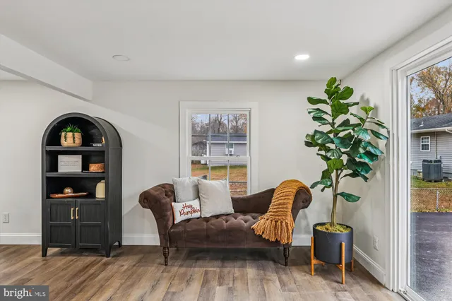 a living room with furniture and decor