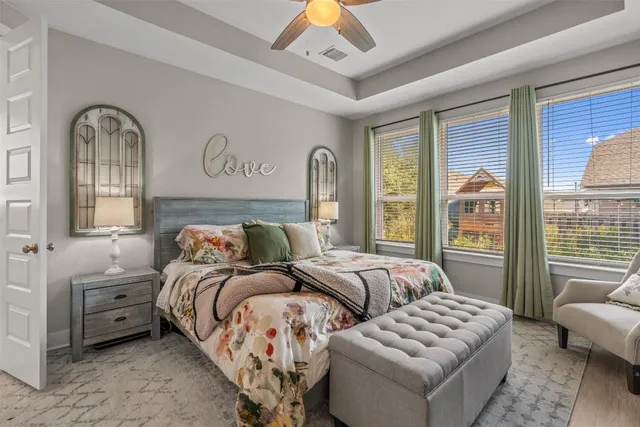 a bed room with a bed and a couch