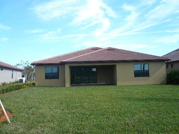 a view of a room with sliding glass door and mountain view