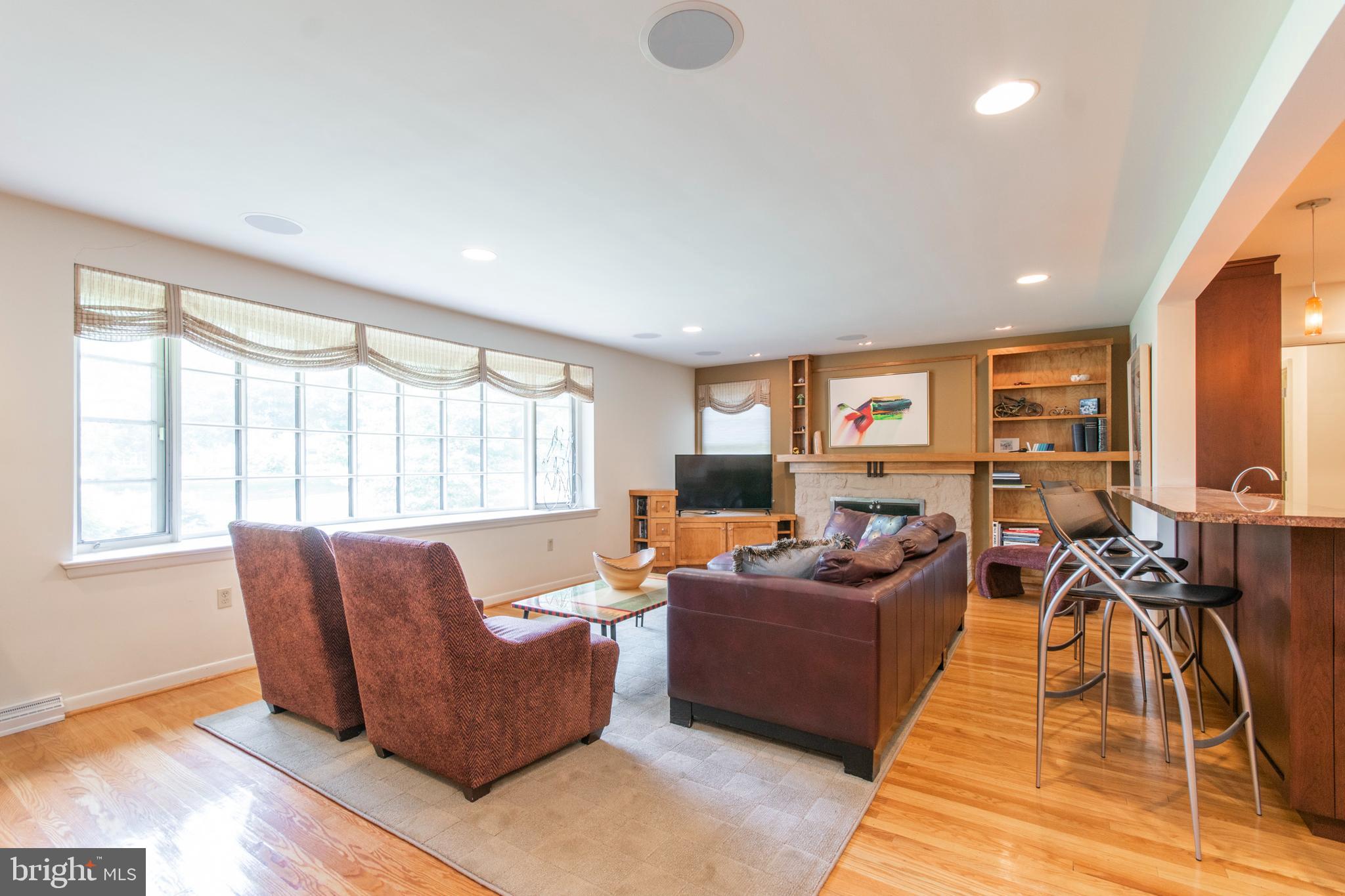 1251 Red Rambler Road Rydal, PA 19046 - Photo 5 of 39 Tons of natural light & stone fireplace