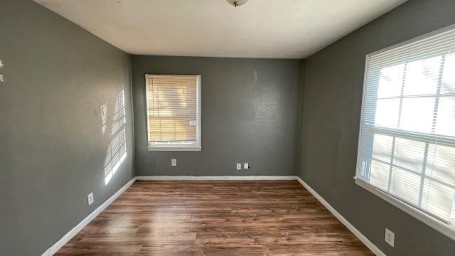 3313 Hatcher Street Fort Worth, TX 76119 - Photo 10 of 15 a view of an empty room with a window