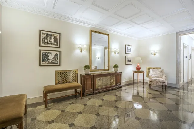 a living room with couches and a view of living room