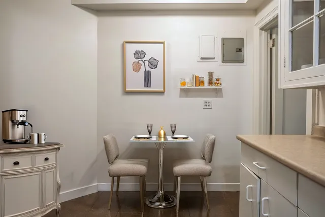 a kitchen with a sink and refrigerator