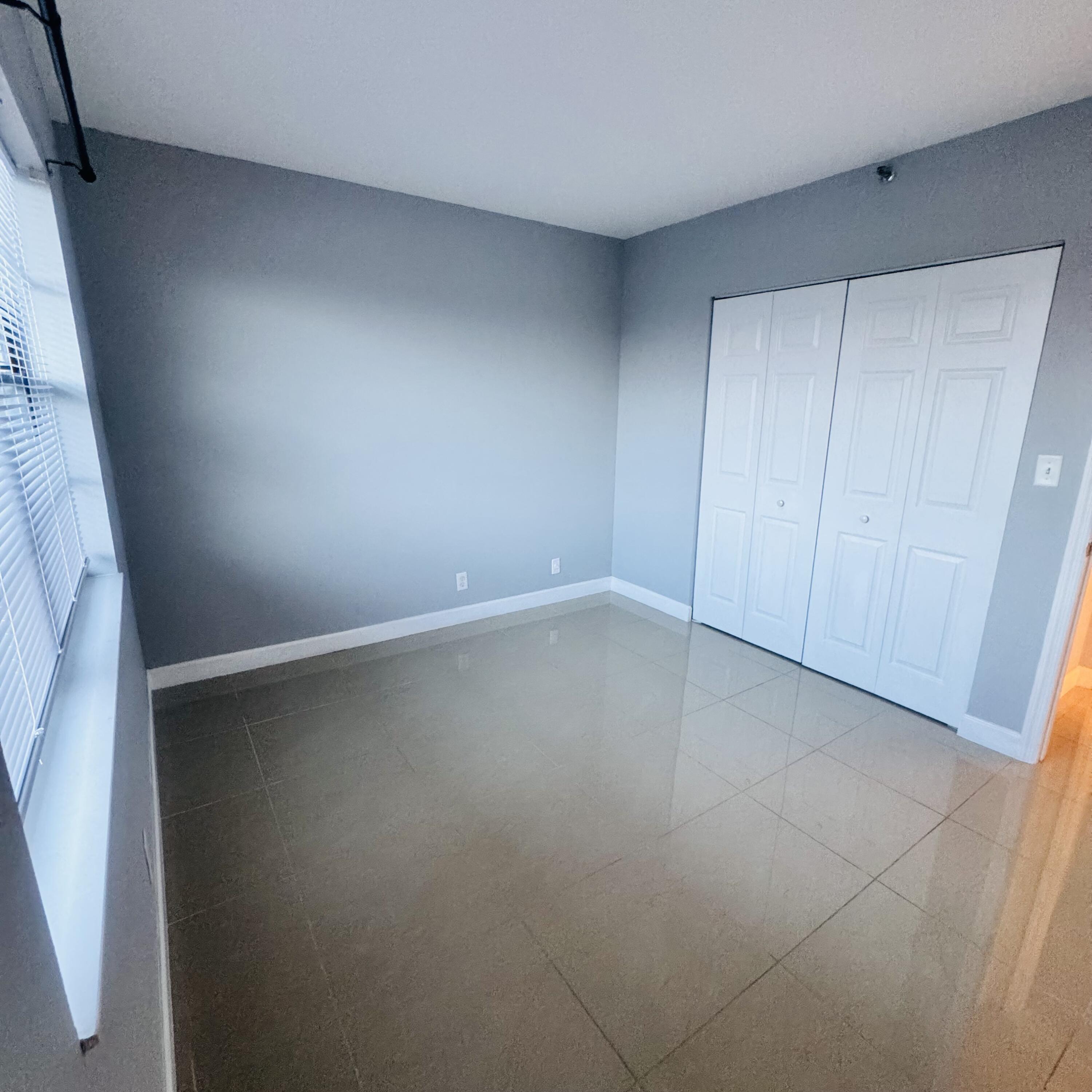 9235 Southwest 8th Street, Unit 503 Boca Raton, FL 33428 - Photo 16 of 17 a view of an empty room