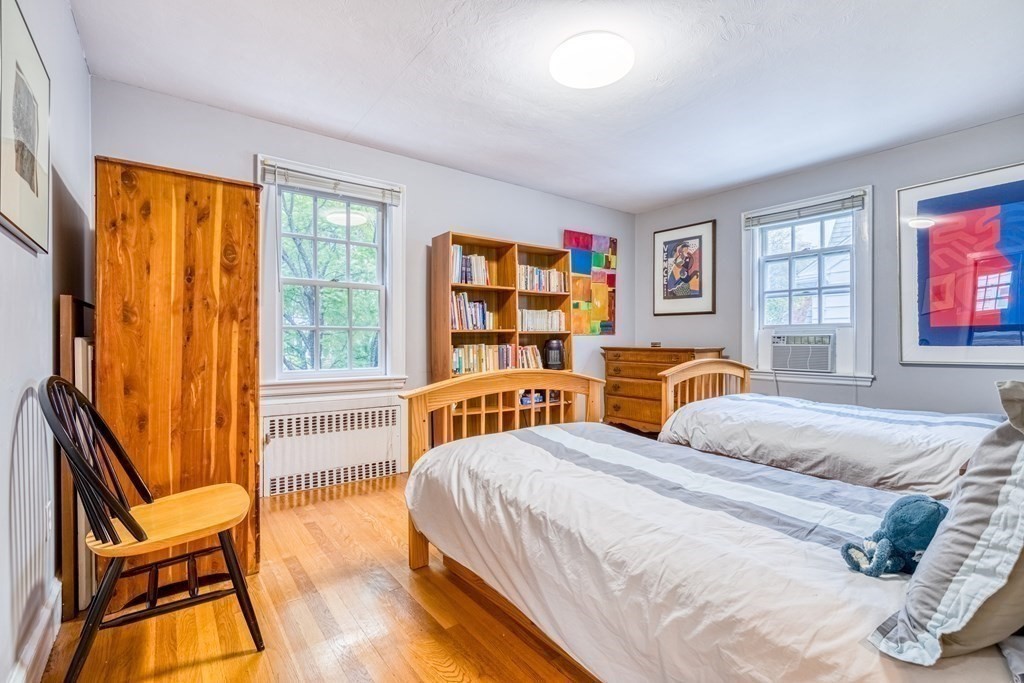 222 Bonad Road Brookline, MA 02467 - Photo 21 of 30 a bedroom with two beds and a large window