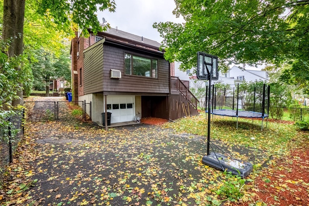 222 Bonad Road Brookline, MA 02467 - Photo 29 of 30 a view of a house with a yard