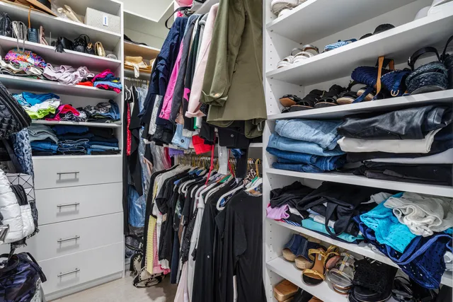 a view of a swimming pool with a patio and a garden
