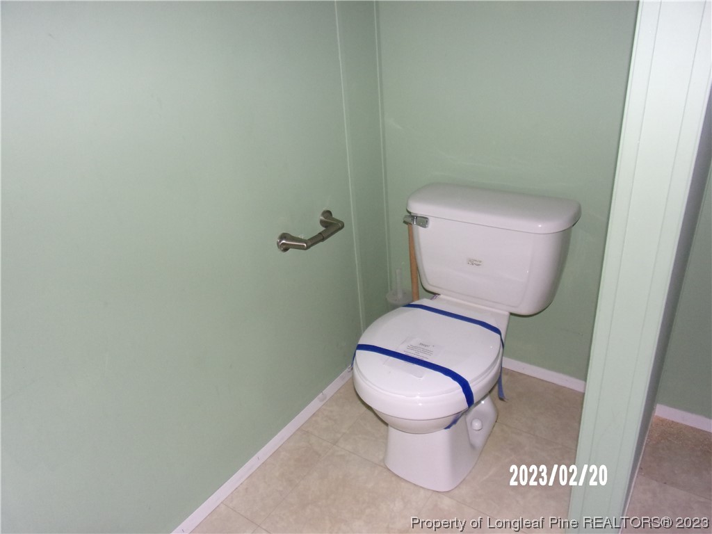 145 Box Elder Terrace Cameron, NC 28326 - Photo 14 of 17 a white toilet sitting next to a white wall
