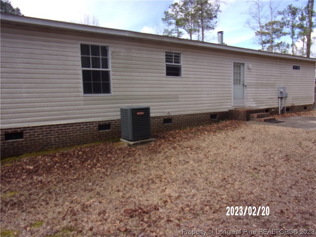 145 Box Elder Terrace Cameron, NC 28326 - Photo 15 of 17 a view of a backyard