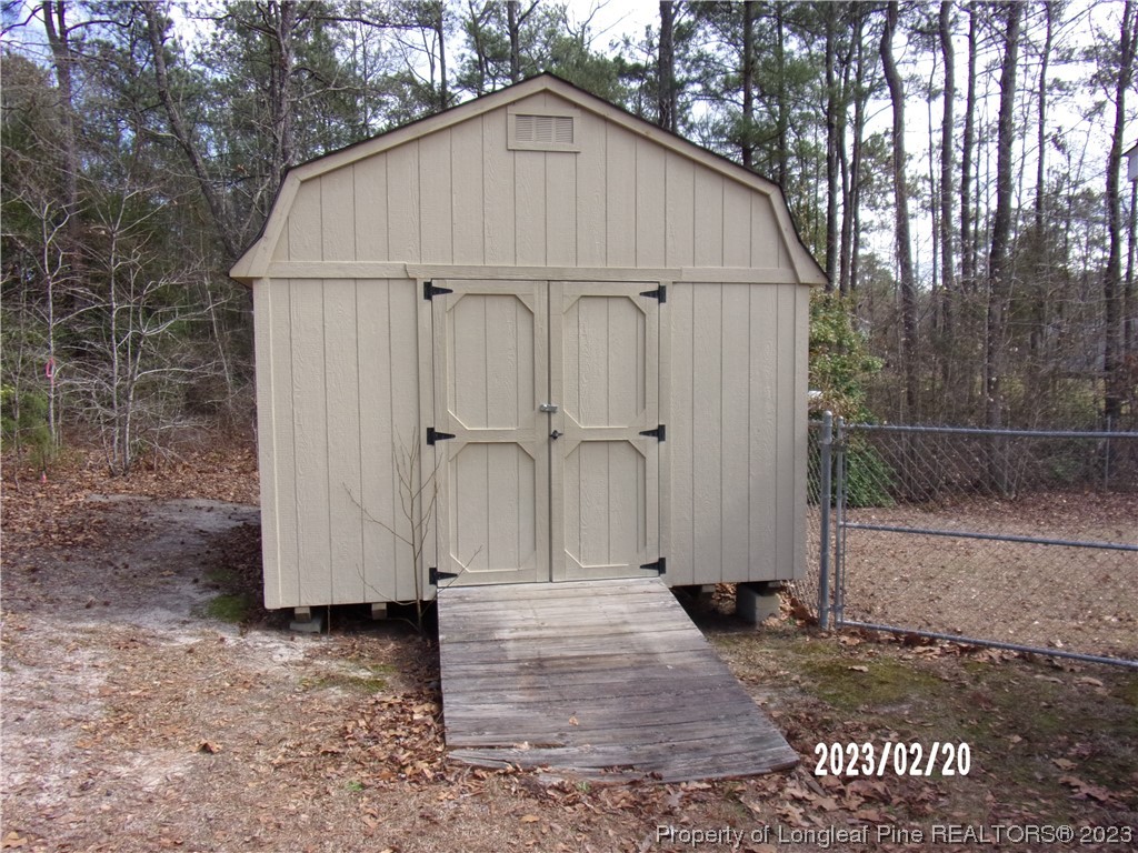 145 Box Elder Terrace Cameron, NC 28326 - Photo 16 of 17 a view of a house with backyard