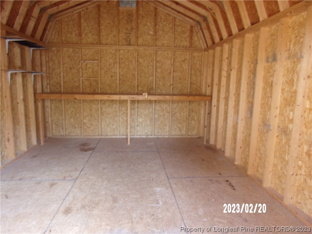 145 Box Elder Terrace Cameron, NC 28326 - Photo 17 of 17 a view of a room with wooden walls