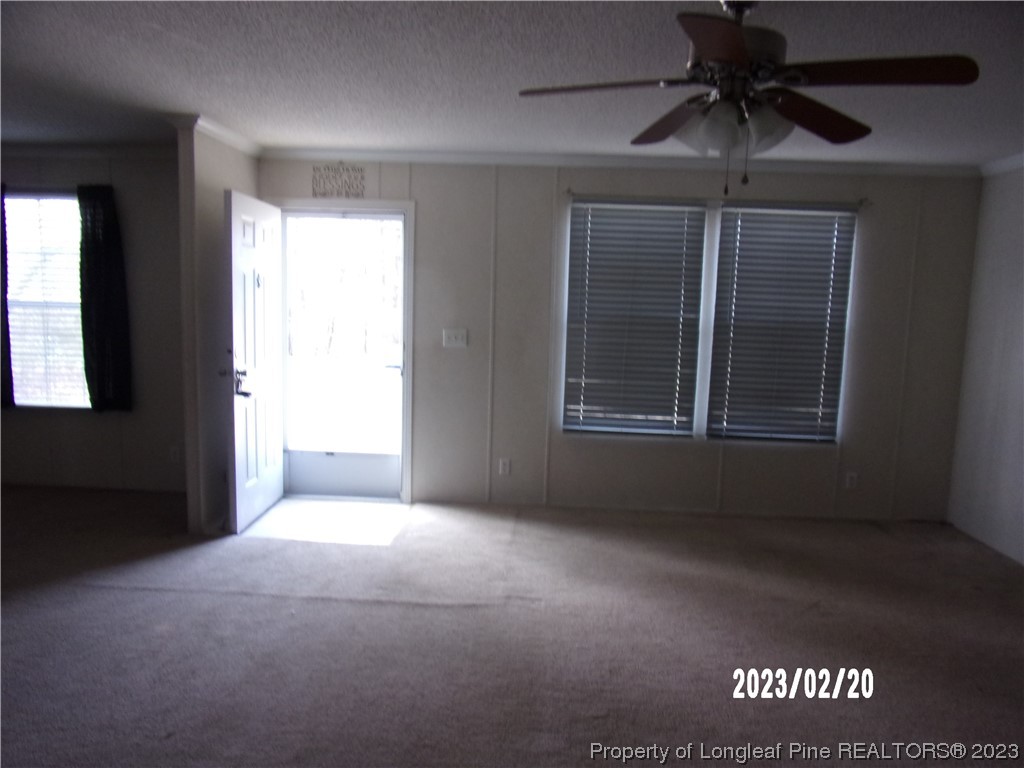 145 Box Elder Terrace Cameron, NC 28326 - Photo 2 of 17 a view of an empty room with a window