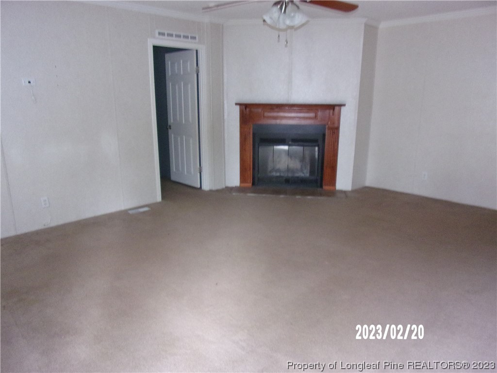 145 Box Elder Terrace Cameron, NC 28326 - Photo 3 of 17 a view of empty room with a fireplace