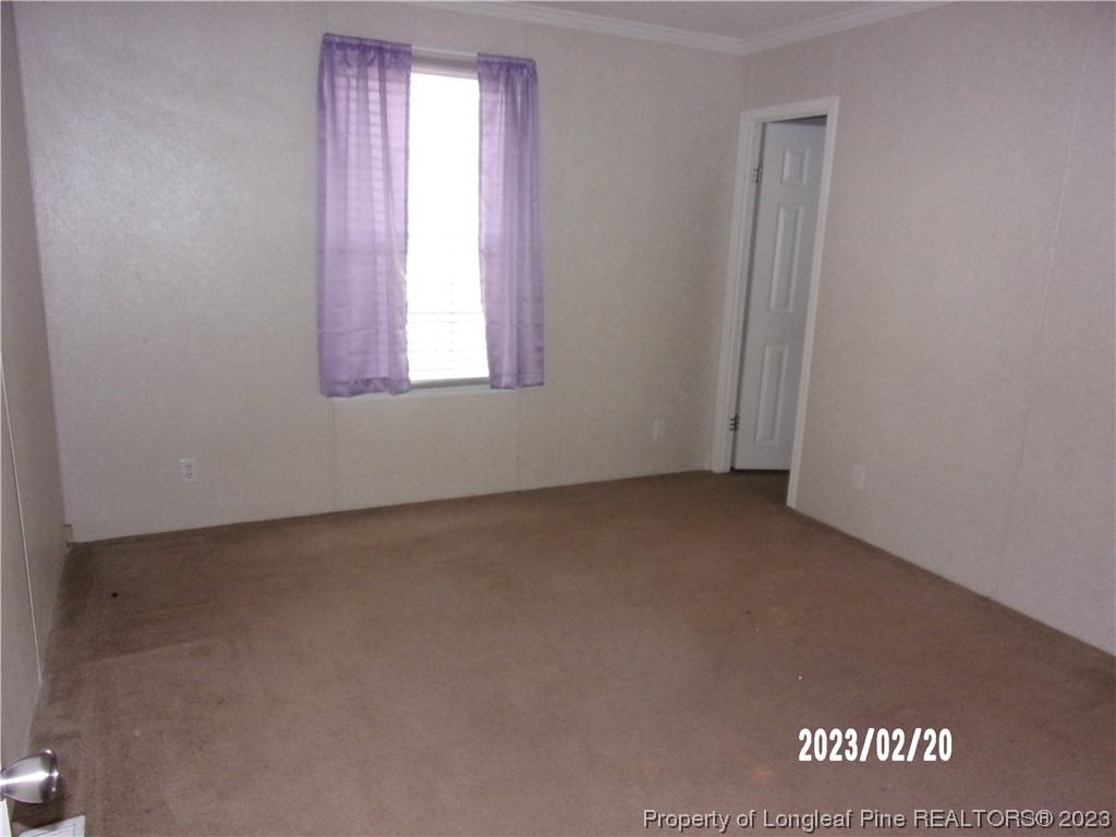 145 Box Elder Terrace Cameron, NC 28326 - Photo 7 of 17 an empty room with a window