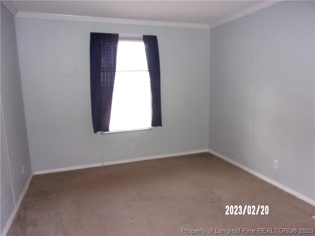 145 Box Elder Terrace Cameron, NC 28326 - Photo 8 of 17 an empty room with a window