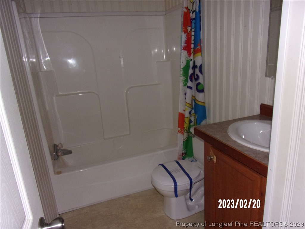 145 Box Elder Terrace Cameron, NC 28326 - Photo 9 of 17 a bathroom with a bathtub and a shower