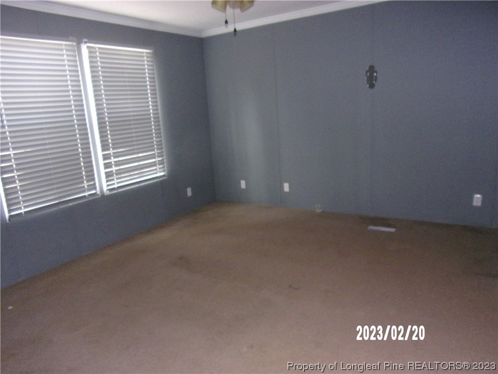 145 Box Elder Terrace Cameron, NC 28326 - Photo 10 of 17 a view of an empty room with a window