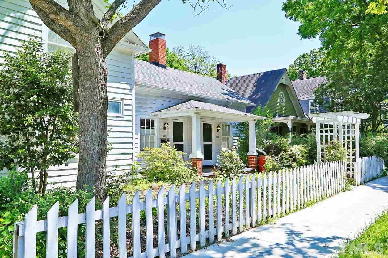 526 North Person Street Raleigh, NC 27604 - Photo 1 of 25 a view of a house with wooden fence