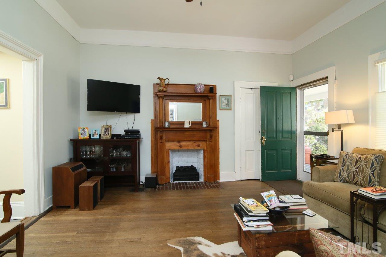 526 North Person Street Raleigh, NC 27604 - Photo 13 of 25 a living room with furniture and a flat screen tv