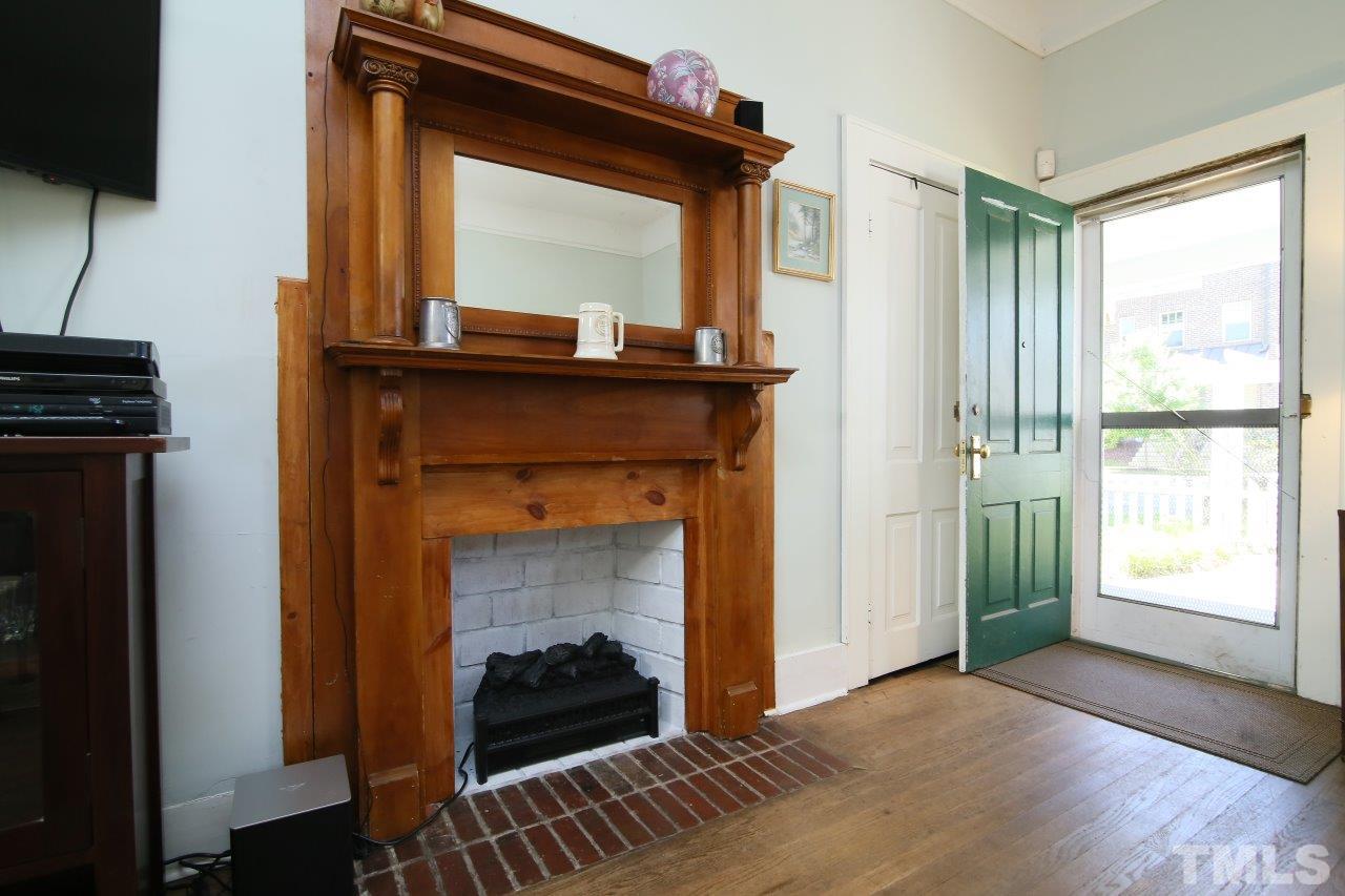 526 North Person Street Raleigh, NC 27604 - Photo 14 of 25 a view of livingroom with furniture and a fireplace