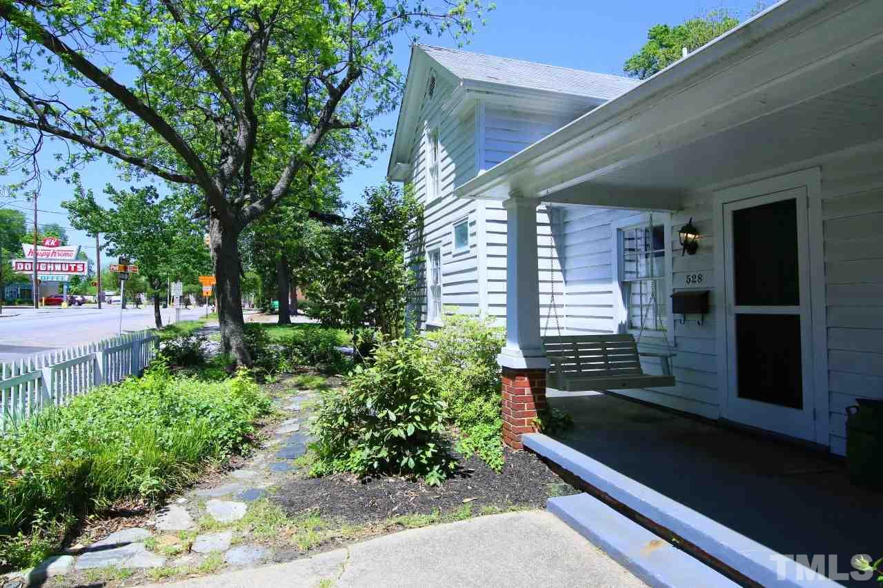 526 North Person Street Raleigh, NC 27604 - Photo 3 of 25 a view of a house with a yard