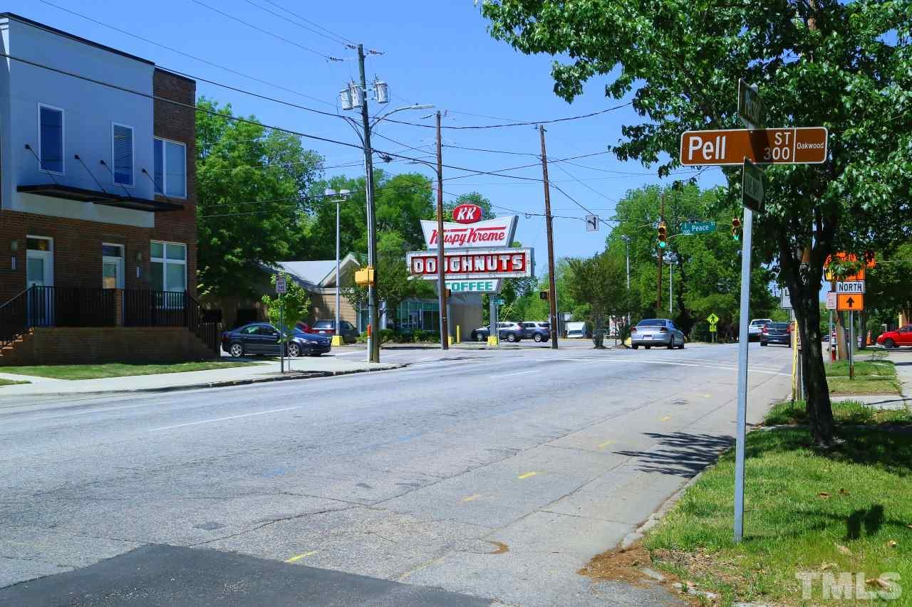 526 North Person Street Raleigh, NC 27604 - Photo 5 of 25 a sign board with buildings
