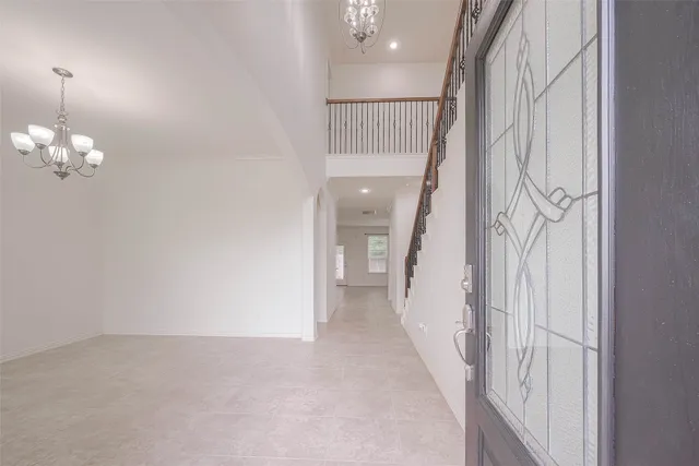 a view of a hallway with a white painted walls