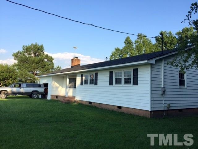 940 Cannan Road Mount Olive, NC 28365 - Photo 2 of 10 a front view of a house with a garden