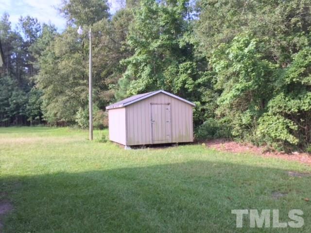 940 Cannan Road Mount Olive, NC 28365 - Photo 9 of 10 a view of backyard of house with green space