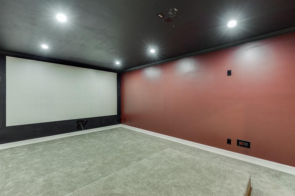 940 Chateau Forest Road Hoschton, GA 30548 - Photo 60 of 87 an empty room with wooden floor and windows