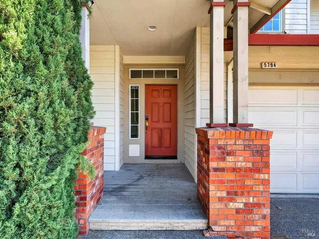 a view of balcony with wooden floor