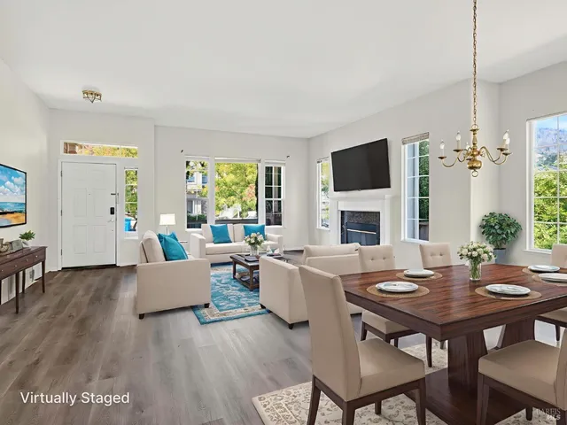 an empty room with windows fire place and windows