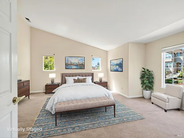 a balcony with wooden floor and fence