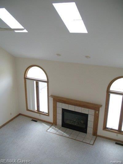 7580 Dell Road Saline, MI 48176 - Photo 5 of 17 SKYLIGHTS IN GREAT ROOM