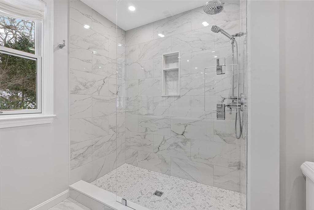 34 Pleasant Street, Unit 5 Wellesley, MA 02482 - Photo 12 of 31 a bathroom with a shower