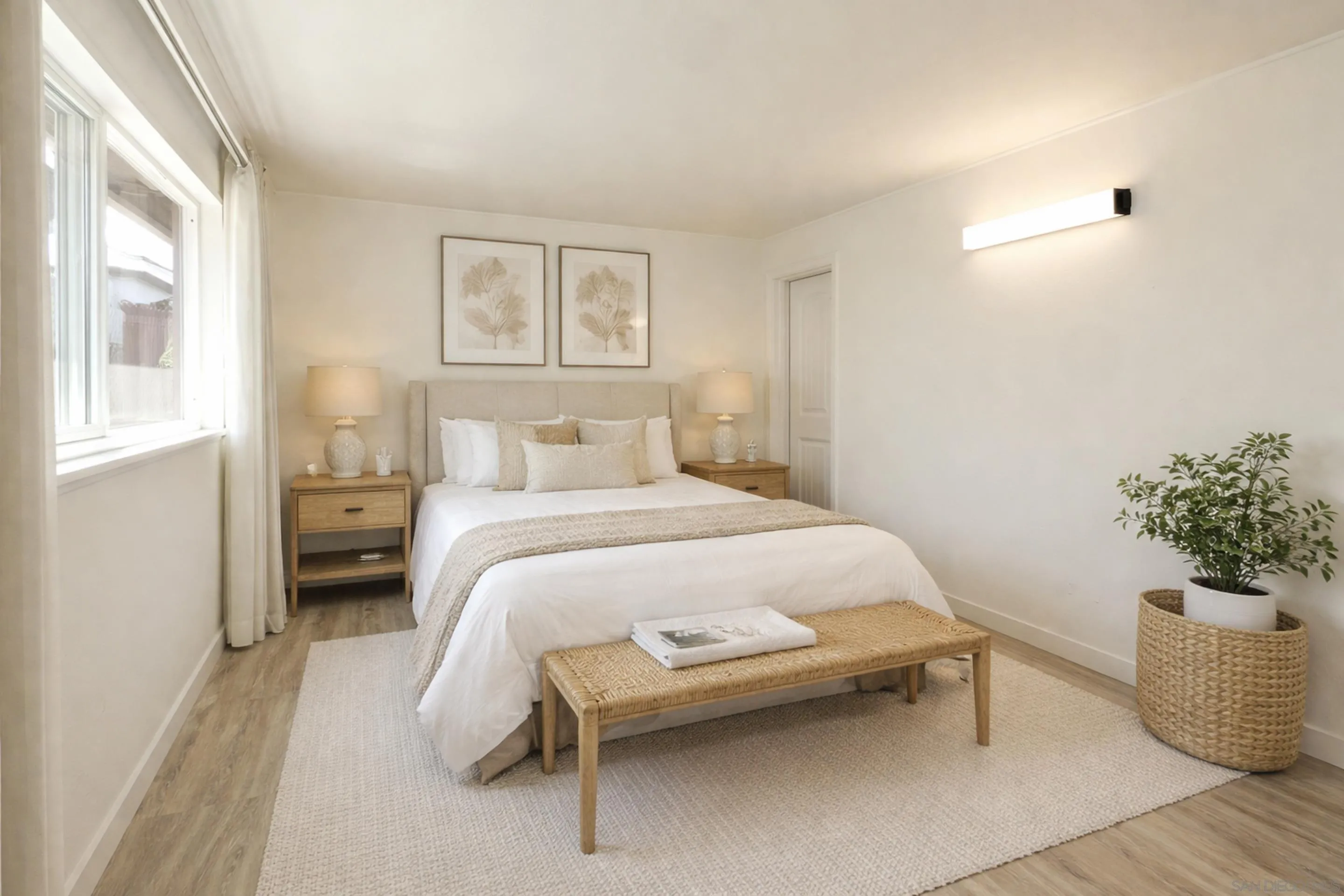 11102 Shadow Hill Way Santee, CA 92071 - Photo 12 of 30 a bedroom with a bed and a potted plant