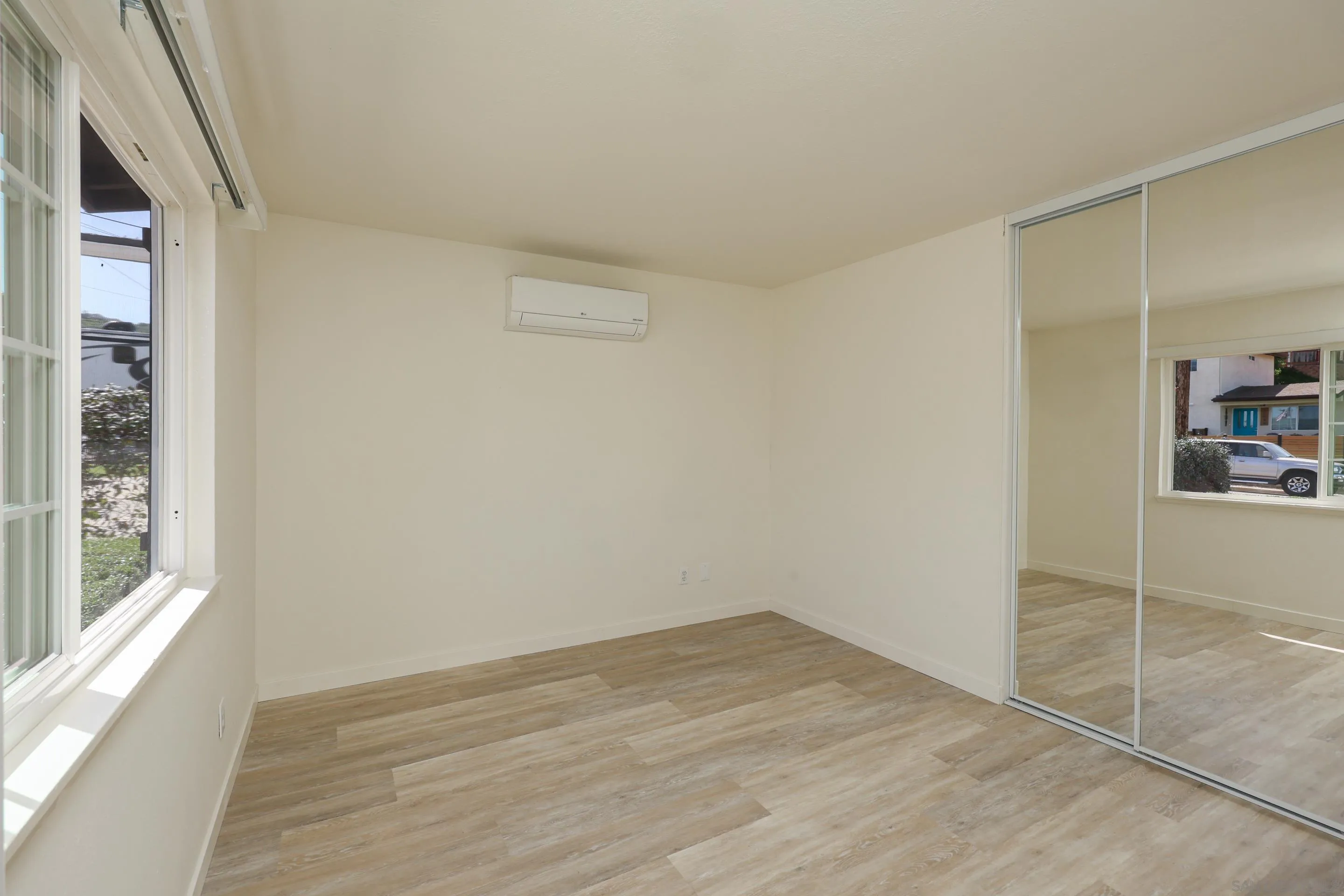 11102 Shadow Hill Way Santee, CA 92071 - Photo 15 of 30 a view of empty room with wooden floor and fan