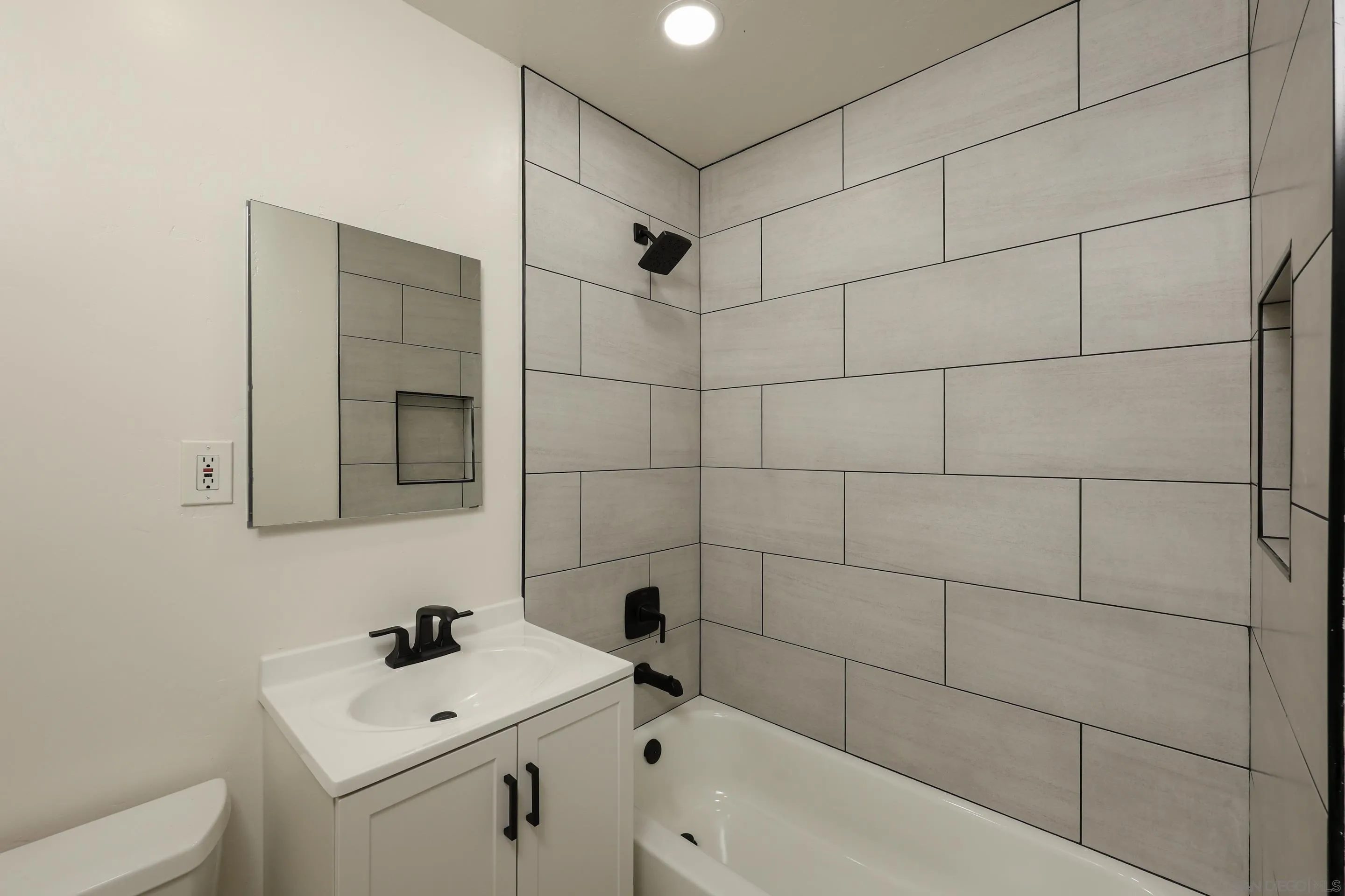 11102 Shadow Hill Way Santee, CA 92071 - Photo 18 of 30 a bathroom with a sink toilet and shower