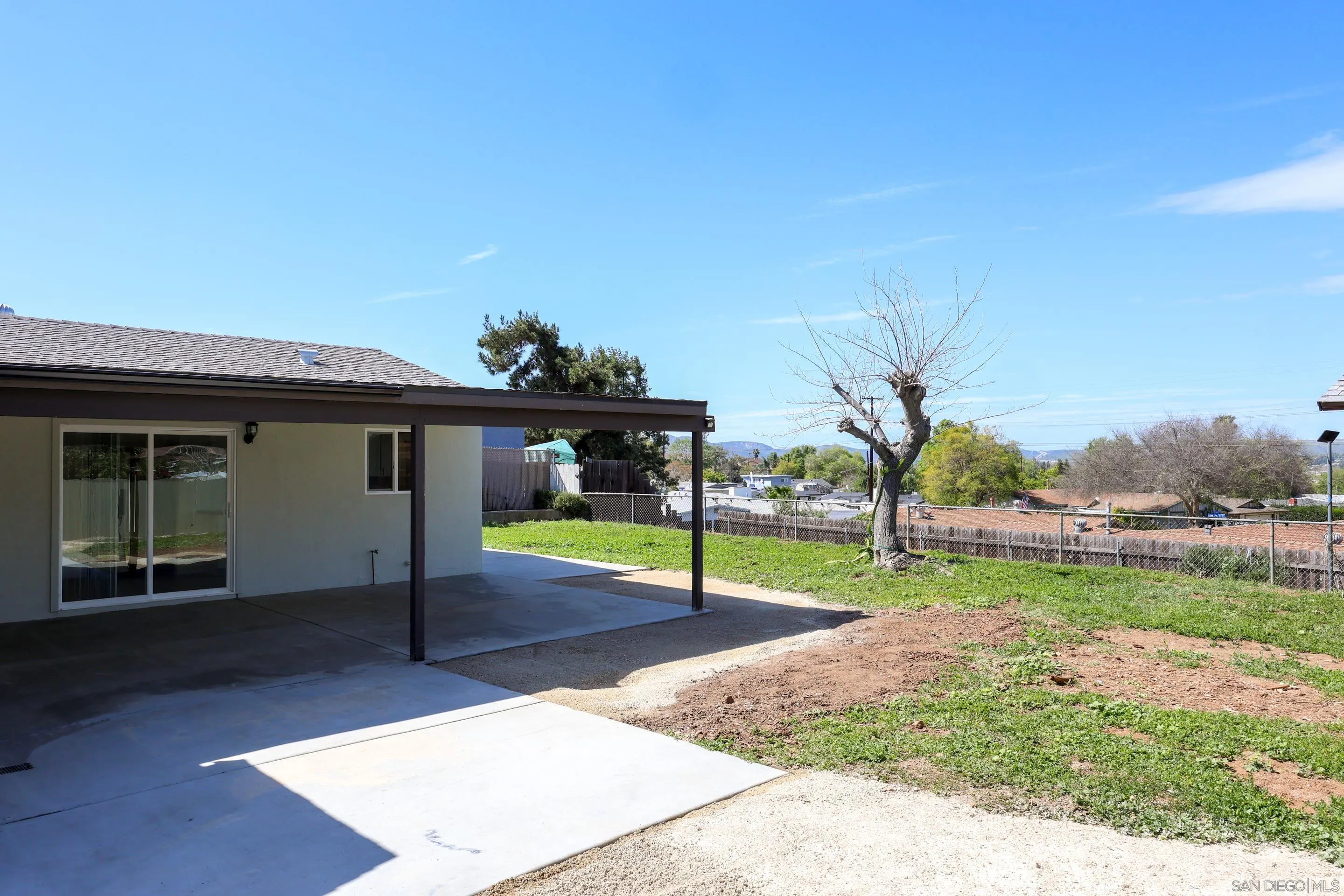 11102 Shadow Hill Way Santee, CA 92071 - Photo 20 of 30 a view of a house with a yard