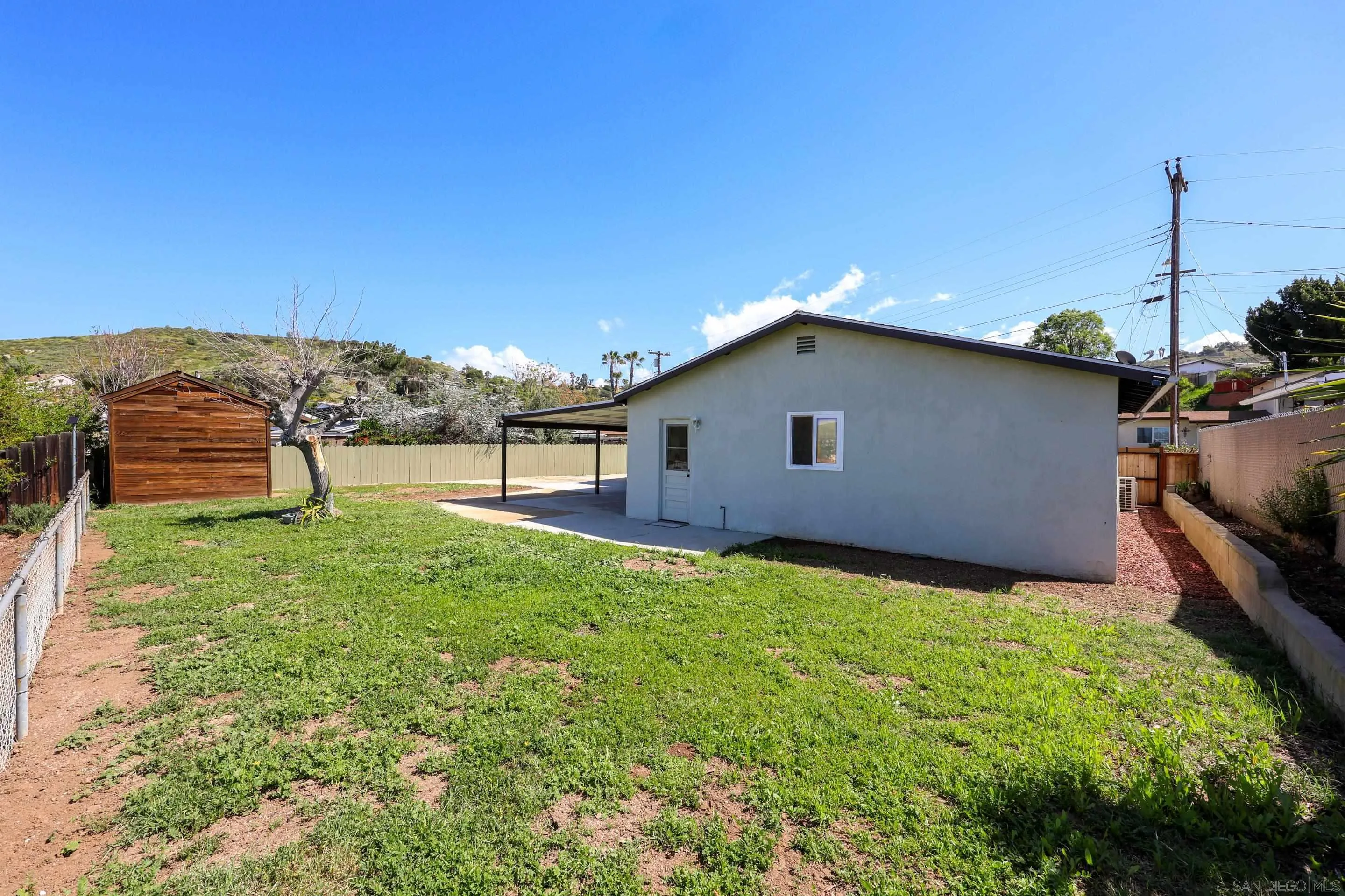 11102 Shadow Hill Way Santee, CA 92071 - Photo 22 of 30 a house view with a garden space