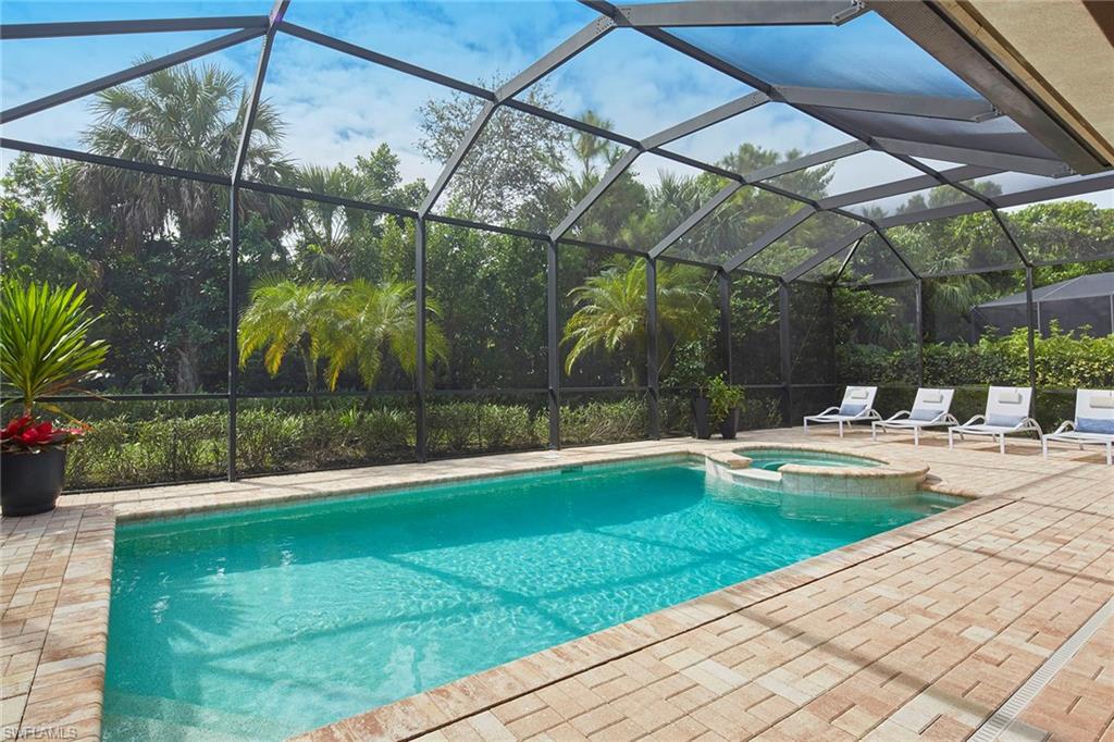 2863 Coco Lakes Drive Naples, FL 34105 - Photo 15 of 39 a view of swimming pool with a patio