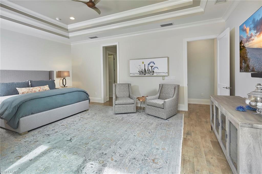 2863 Coco Lakes Drive Naples, FL 34105 - Photo 18 of 39 a living room with furniture and a couch