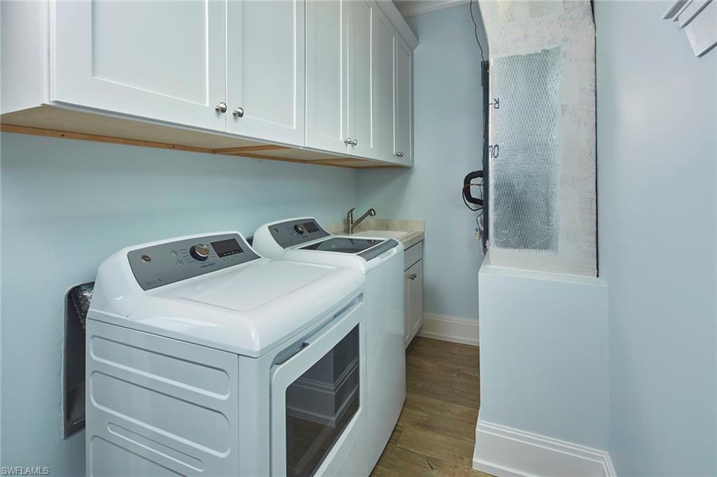 2863 Coco Lakes Drive Naples, FL 34105 - Photo 28 of 39 a utility room with dryer and washer