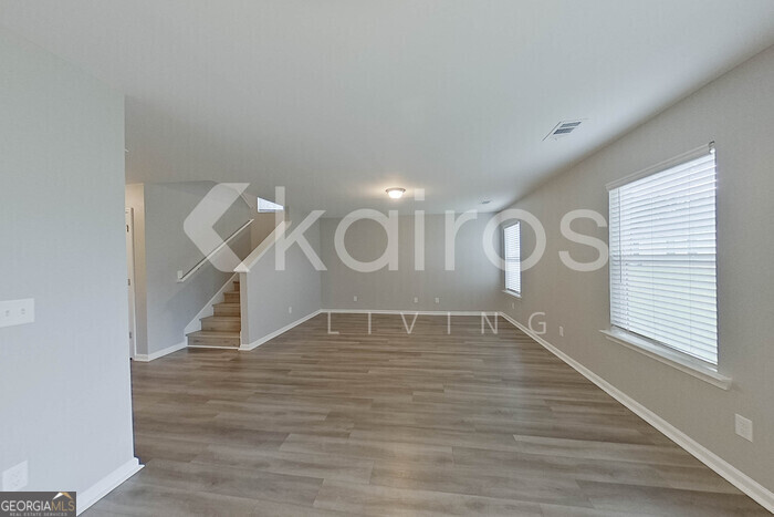105 Colonial Way Springfield, GA 31329 - Photo 12 of 30 a view of empty room with wooden floor