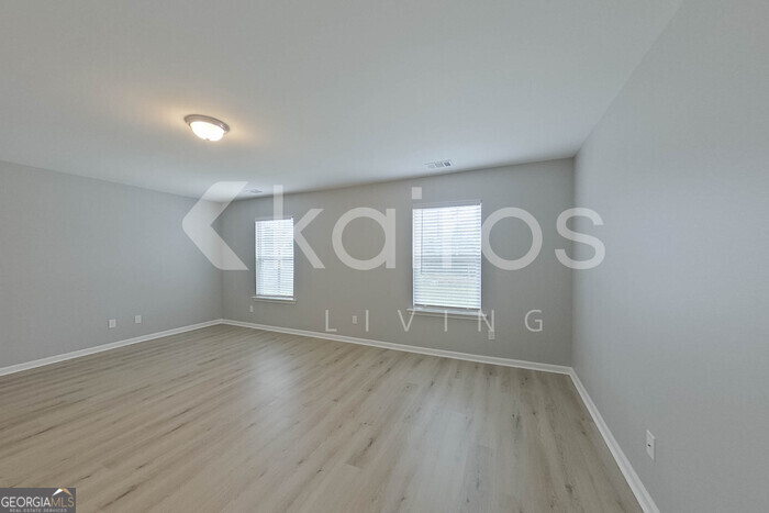 105 Colonial Way Springfield, GA 31329 - Photo 15 of 30 a view of room with window and wooden floor