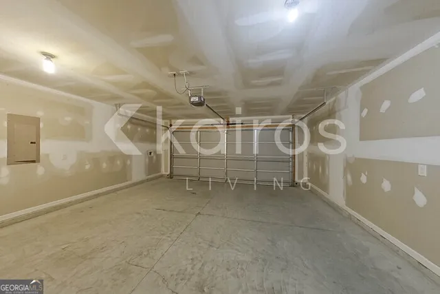 an empty room with white walls and white walls