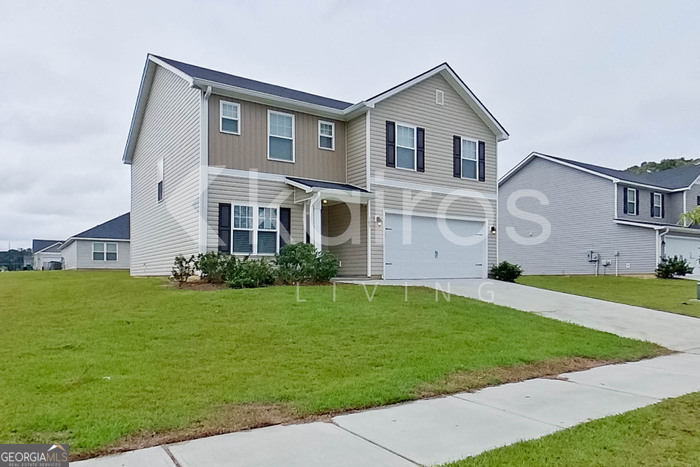 105 Colonial Way Springfield, GA 31329 - Photo 3 of 30 a front view of a house with a yard